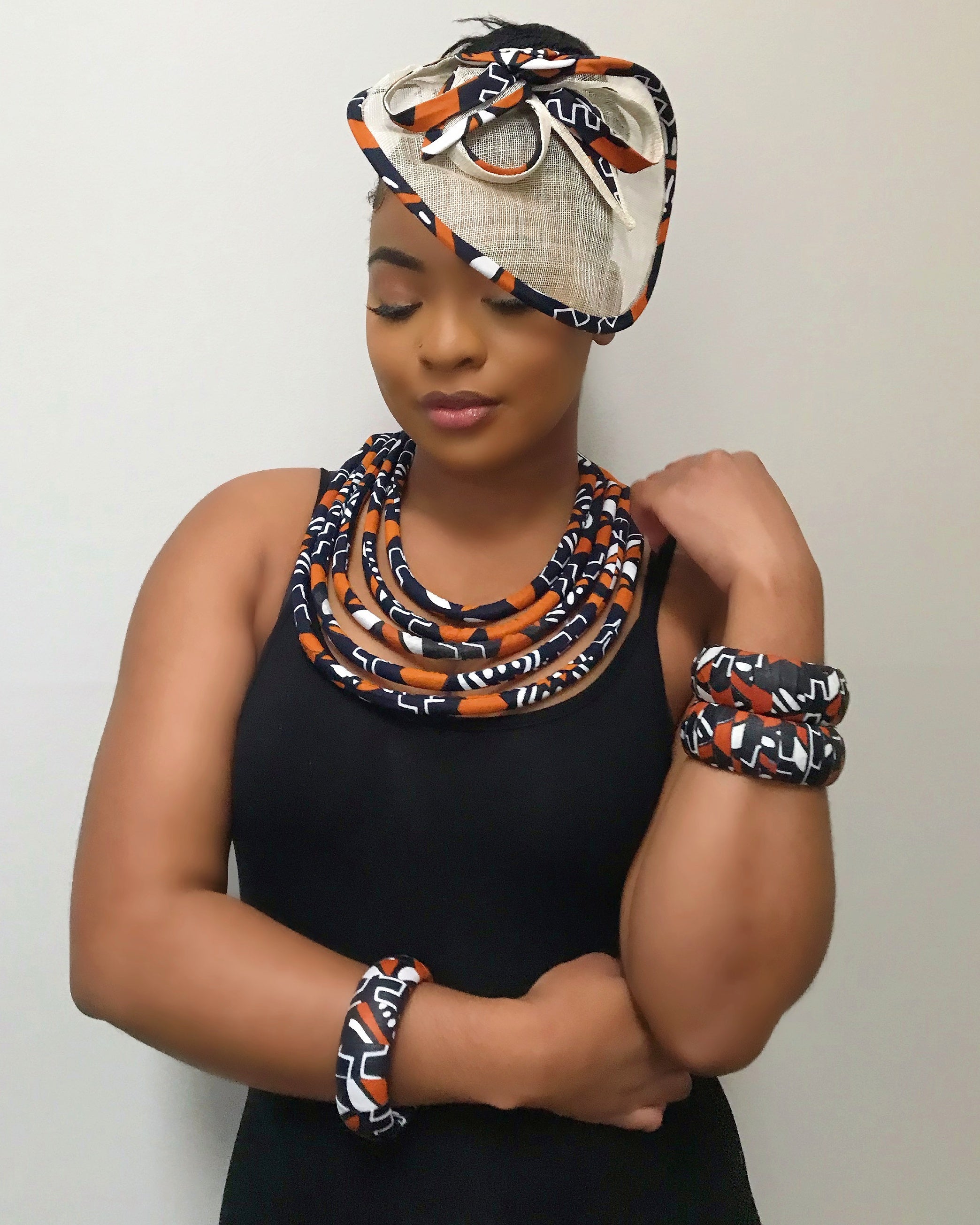 Cowria African Print Fascinator Hat - Brown / Black / White